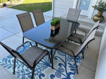 7 Piece Outdoor Furniture Set with 6 Brown Chairs and Table!
