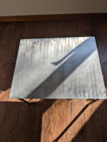 Artist made stainless steel side coffee table