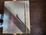 Artist made stainless steel side coffee table