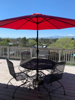 Heavy cast iron metal patio table 4 chairs glider rocker umbrella