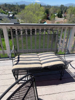 Heavy cast iron metal patio table 4 chairs glider rocker umbrella