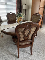 Beautiful dining table with three chairs