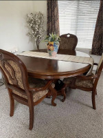 Beautiful dining table with three chairs