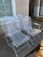 Wrought Iron Table and 4 Rocking Chairs