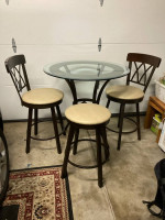 Counter height glass table with 3 stools