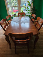 Solid wood dining table with 6 chairs and leaf