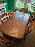 Solid wood dining table with 6 chairs and leaf