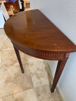 Antique crescent table