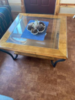Glass topped coffee table
