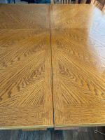 Tall dinning room table and 8 chairs