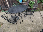 Metal patio table and 4 chairs