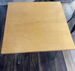 solid wood top table w/ metal legs that folds flat