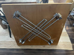solid wood top table w/ metal legs that folds flat