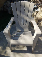 Three Patio stackable plastic chair set and side table