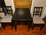 Solid wood black dining table with extensions, chairs