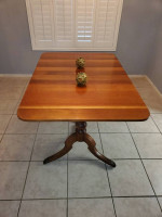 Dining Table includes 3 leaves