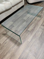 Glass waterfall coffee table