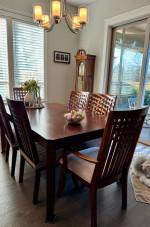Dining room table, chairs and cabinet