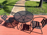Round outdoor patio table and chairs
