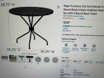 Round outdoor patio table and chairs