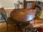 Round wood and wrought iron table with 4 chairs