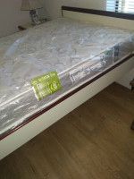 Twin bed and bedside table