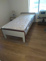 Twin bed and bedside table