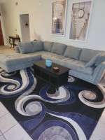 Sectional Sofa & Area Rugg