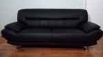 Brand new real black leather sofa