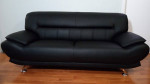 Brand new real black leather sofa