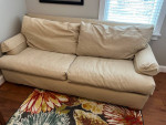Big soft, cozy, and down-filled sofa couch Beige cotton canvas