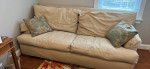 Big soft, cozy, and down-filled sofa couch Beige cotton canvas