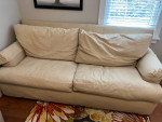 Big soft, cozy, and down-filled sofa couch Beige cotton canvas