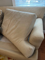 Big soft, cozy, and down-filled sofa couch Beige cotton canvas