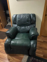 Green leather sofa and recliner.