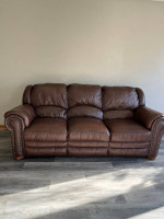Waukesha Reclining faux leather sofa