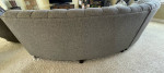 curved sofa tufted couch gray taupe storage ottoman and  pillows