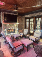 Woodard Patio Furniture: Swivel Chairs, Sofa, Dining Set, & More
