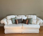 Cream colored sofa with floral pattern
