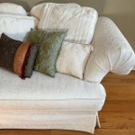 Cream colored sofa with floral pattern