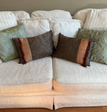 Cream colored sofa with floral pattern