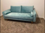 Blue velvet sofa