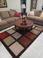 Sofa, loveseat, 2 end tables and round coffee table