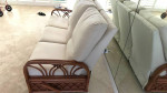 Tropical 3 seat sofa with rattan arms.