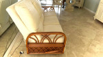 Tropical 3 seat sofa with rattan arms.