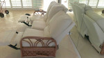 Tropical 3 seat sofa with rattan arms.