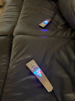 Leather recliner sofa with dual heat and massage function