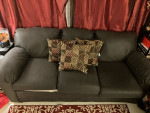 Brown sofa and loveseat