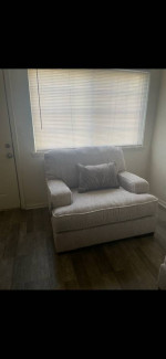Selling Sofa and Chair With Ottoman (pillows included)