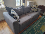 Complete your home with this gray sofa